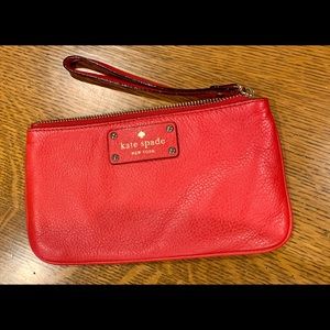 Red Kate Spade clutch wristlet